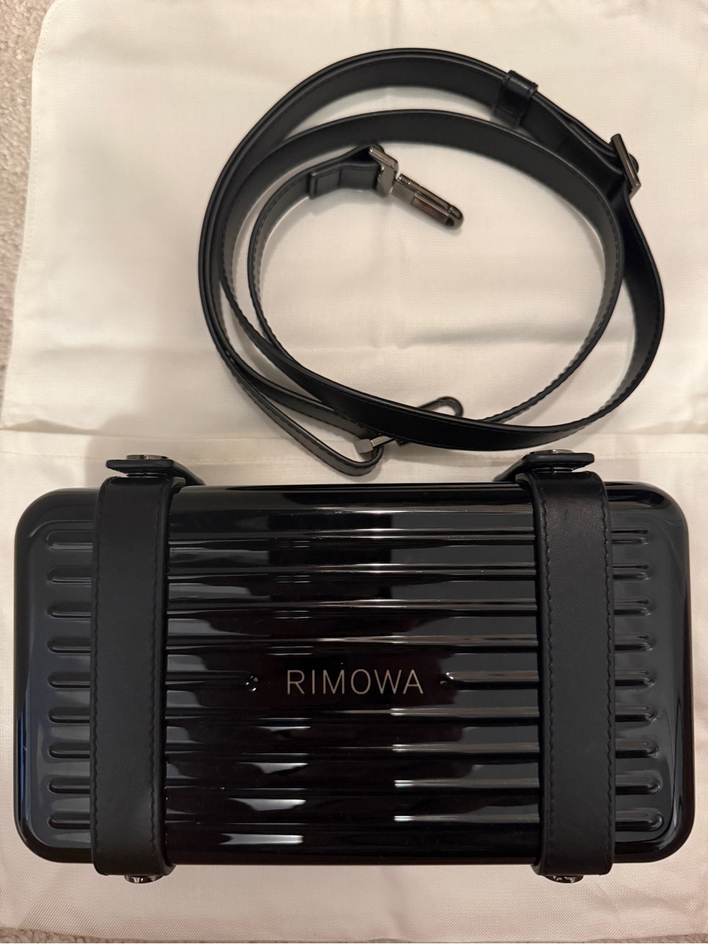 RIMOWA Black Glossy Hard-Shell Crossbody Trunk - Polycarbonate Personal Bag